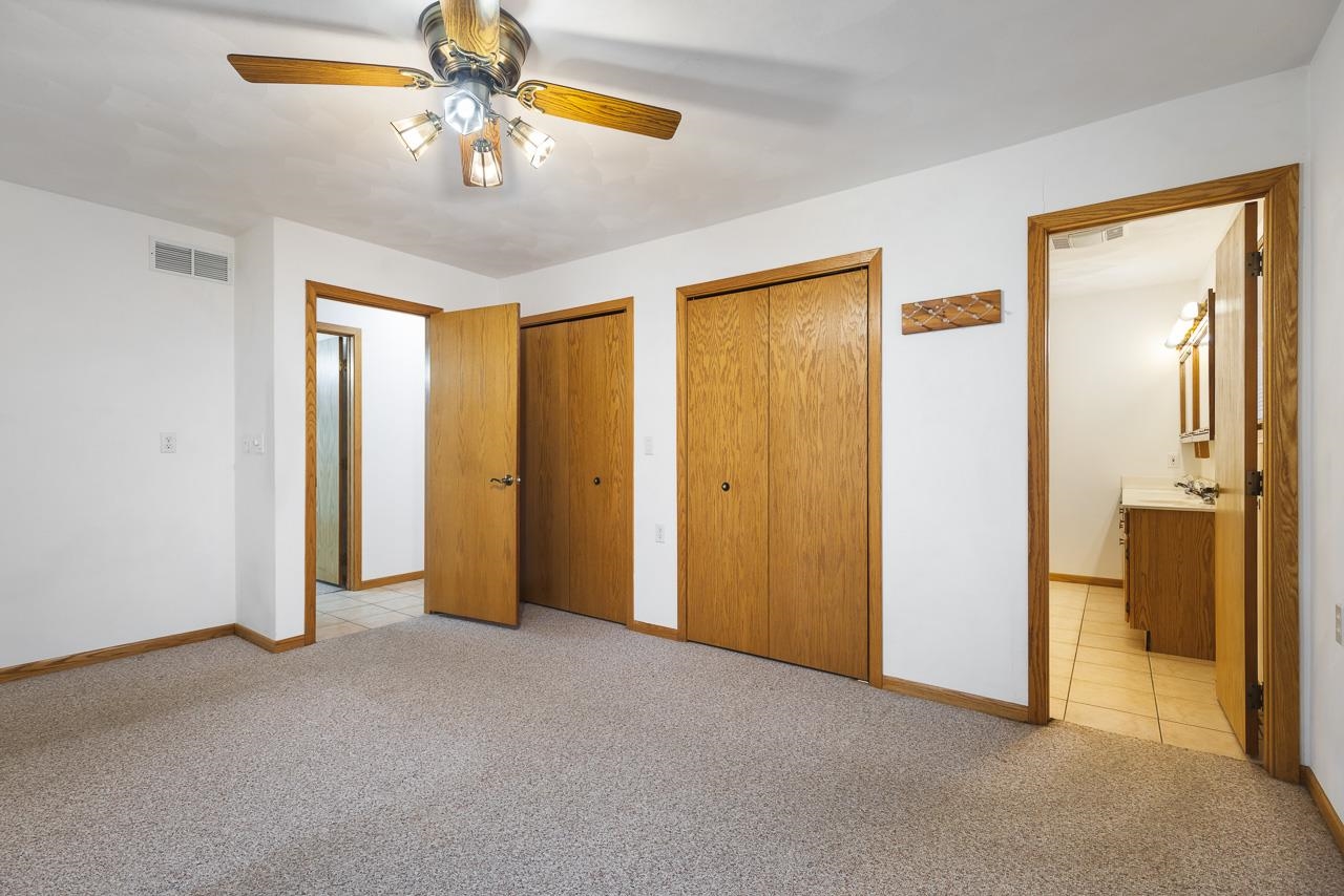 3178 North Berlin School Road Ridott, IL 61067 - Photo 24 of 47 a view of empty room with ceiling fan
