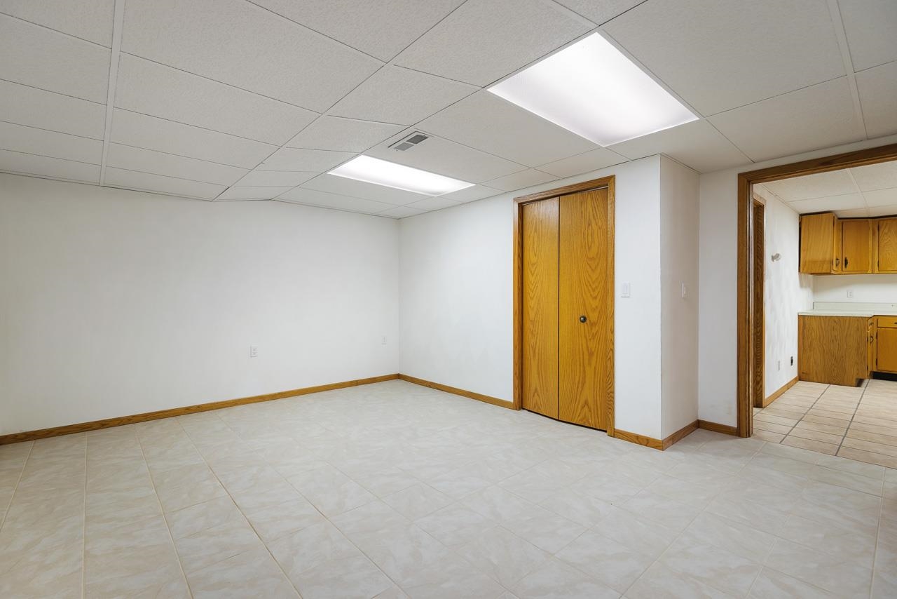 3178 North Berlin School Road Ridott, IL 61067 - Photo 31 of 47 an empty room with windows