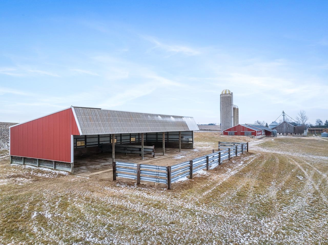 3178 North Berlin School Road Ridott, IL 61067 - Photo 34 of 47 a house view with a sitting space and wooden fence