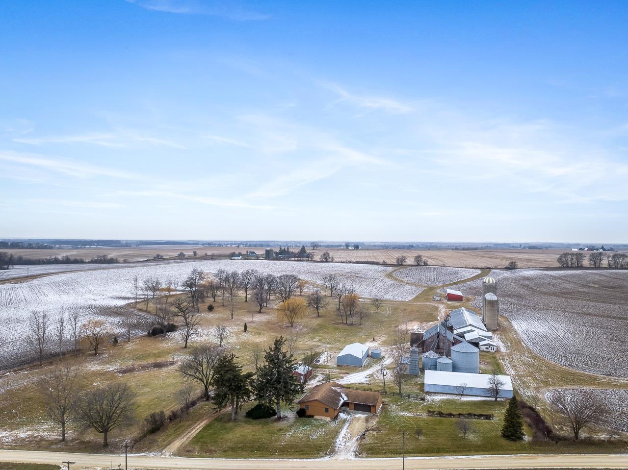 3178 North Berlin School Road Ridott, IL 61067 - Photo 7 of 47 an aerial view of a city