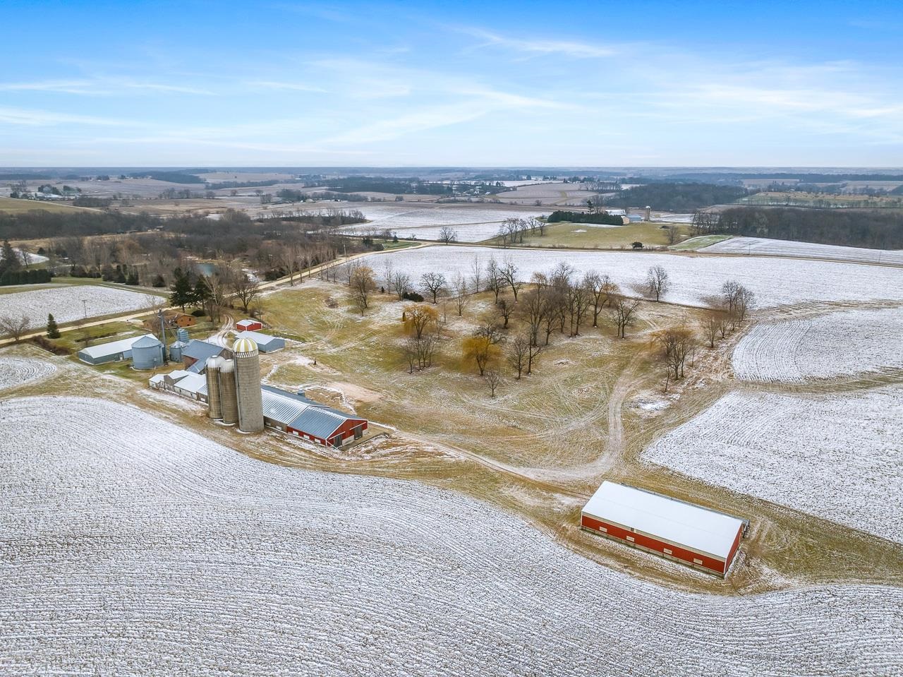 3178 North Berlin School Road Ridott, IL 61067 - Photo 9 of 47 an aerial view of a city