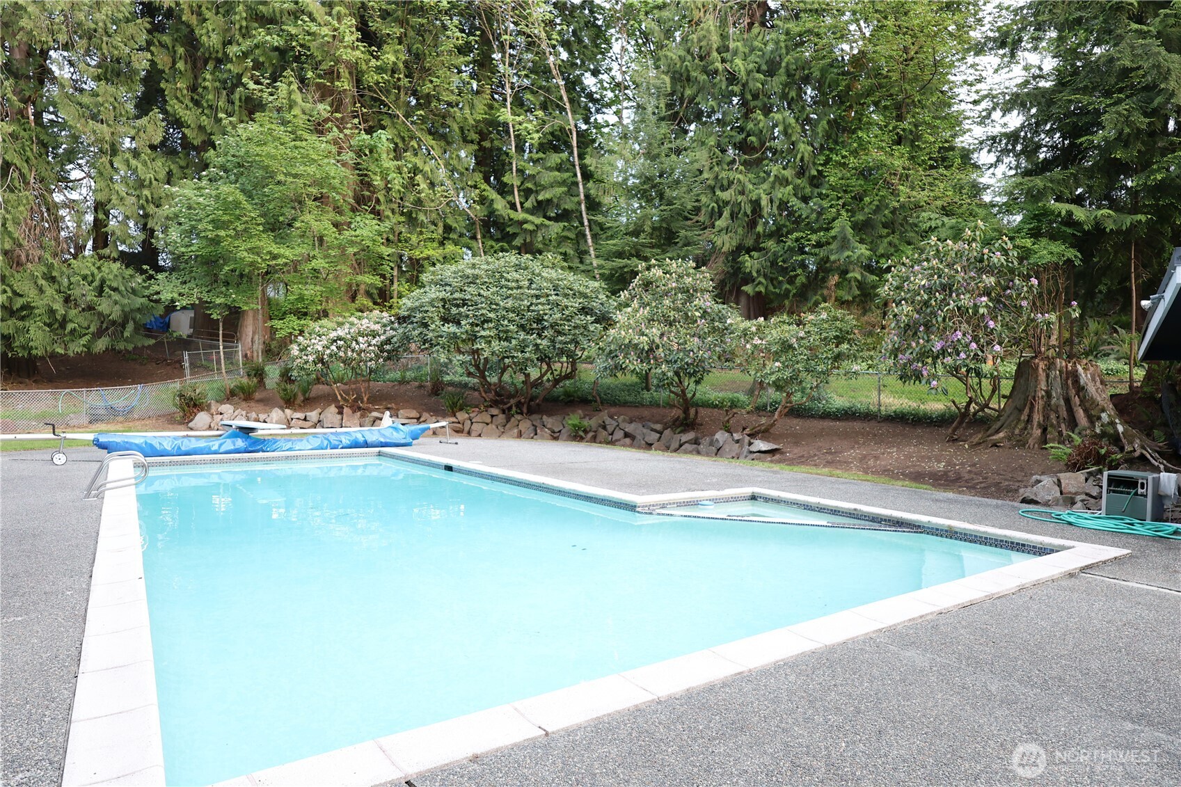 14325 Kast Road Monroe, WA 98272 - Photo 10 of 28 a view of a swimming pool with a yard