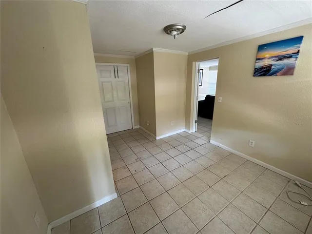 a view of an empty room and window