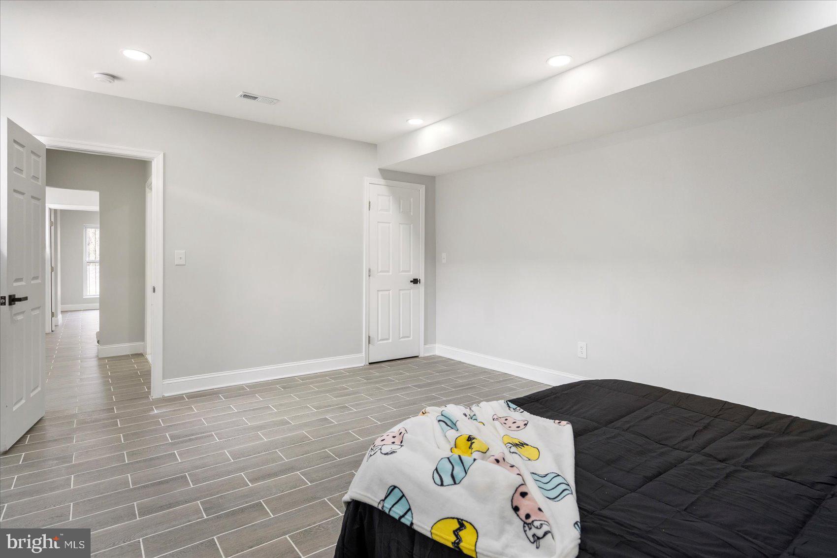 4002 Derby Manor Drive Baltimore, MD 21215 - Photo 25 of 32 a very nice looking room with a wooden floor