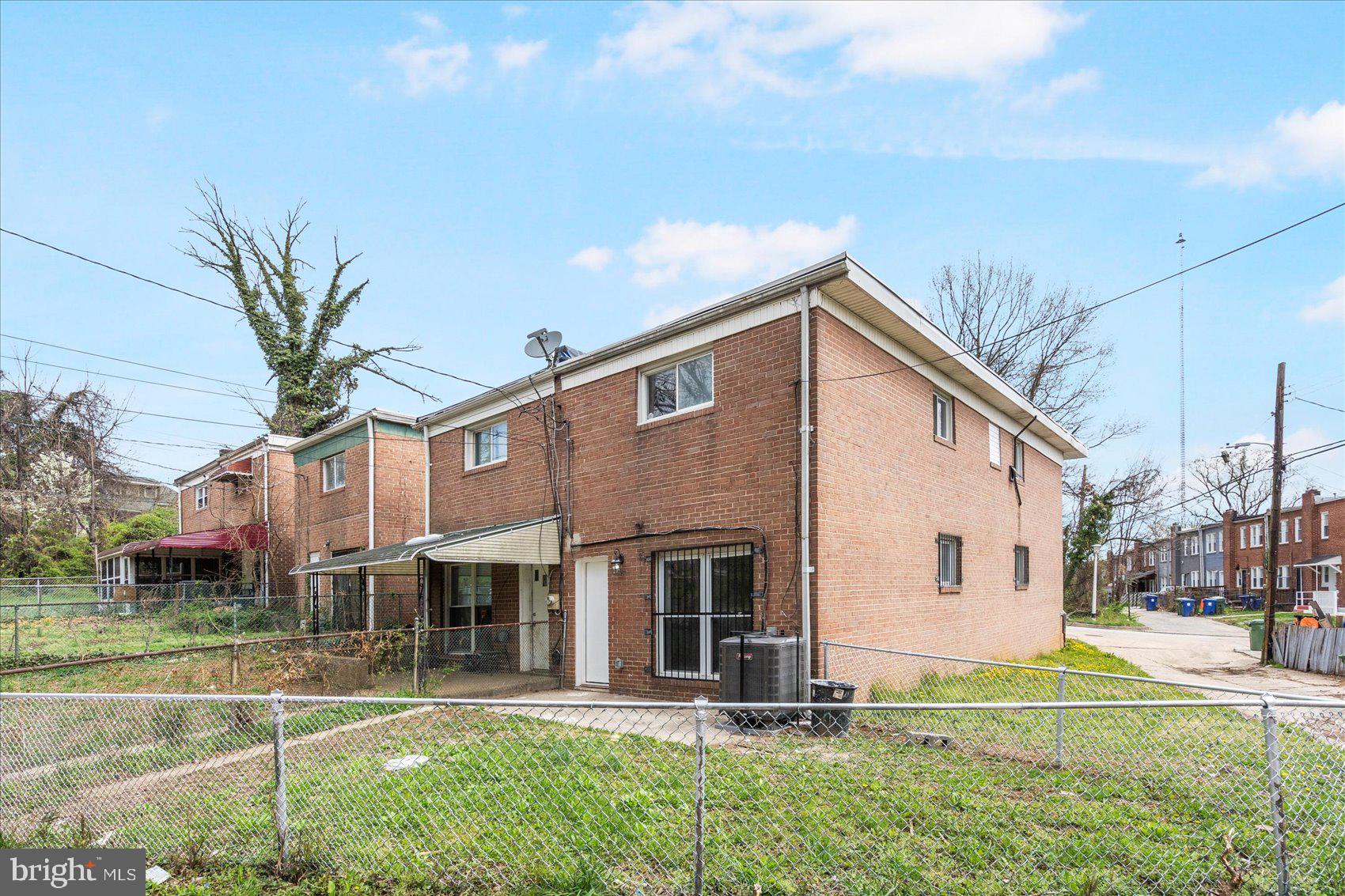 4002 Derby Manor Drive Baltimore, MD 21215 - Photo 28 of 32 a view of a house with a yard