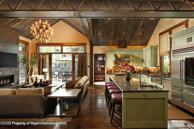 a view of a living room and dining room