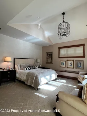 a bedroom with bed and window
