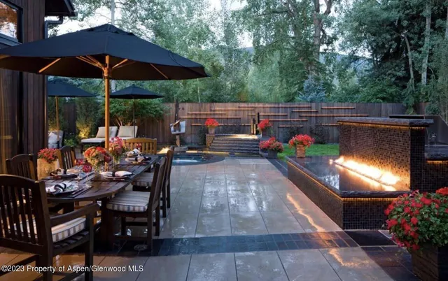 an outdoor space with patio lots of furniture