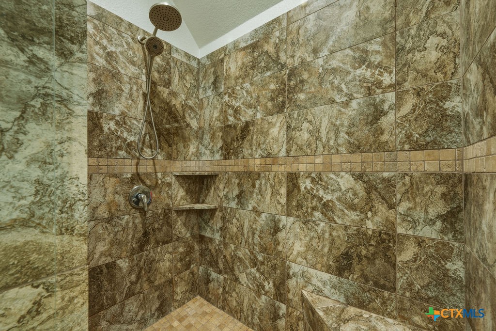 3306 Spring Canyon Road Belton, TX 76513 - Photo 26 of 40 a bathroom with a shower