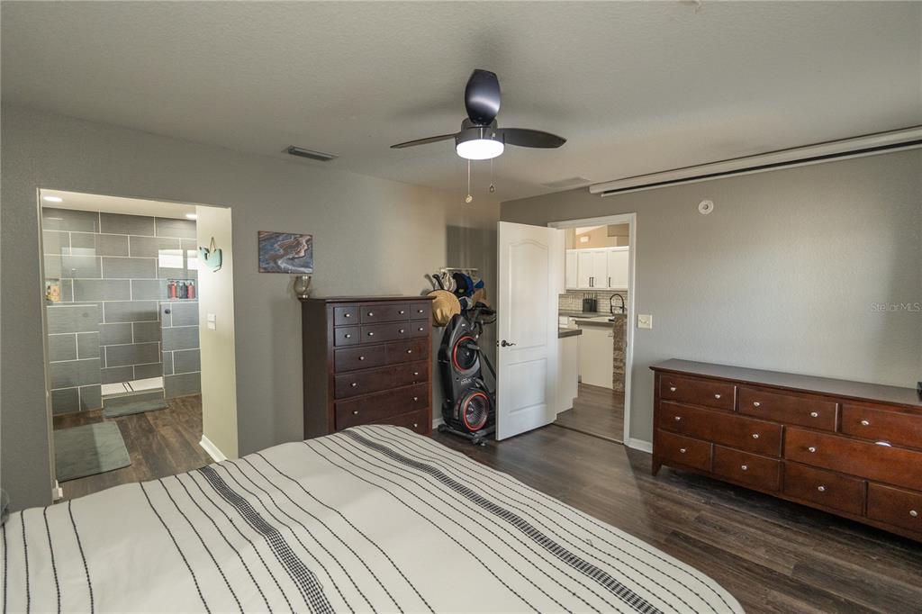 6 Fir Drive Trace Ocala, FL 34472 - Photo 15 of 41 a bed room with a bed and a walk in closet