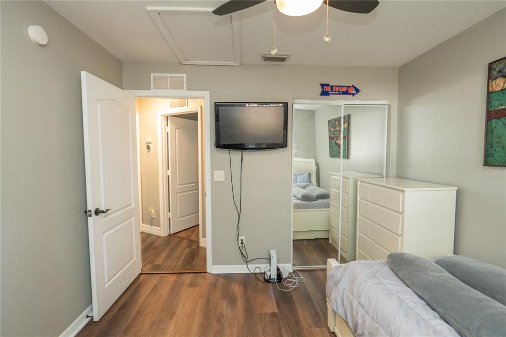 6 Fir Drive Trace Ocala, FL 34472 - Photo 23 of 41 a bedroom with a bed and a flat screen tv