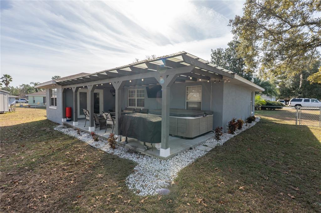 6 Fir Drive Trace Ocala, FL 34472 - Photo 30 of 41 a view of a house with backyard