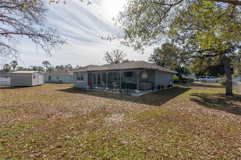 6 Fir Drive Trace Ocala, FL 34472 - Photo 39 of 41 a front view of a house with a yard