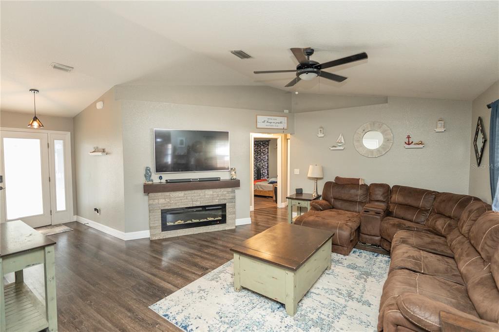 6 Fir Drive Trace Ocala, FL 34472 - Photo 5 of 41 a living room with furniture and a flat screen tv