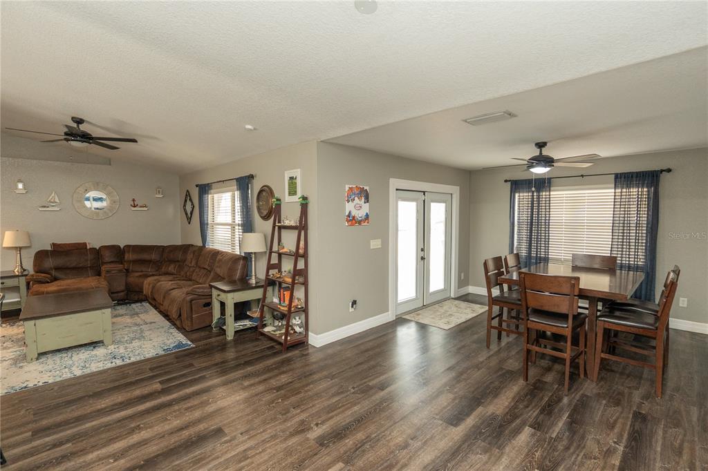 6 Fir Drive Trace Ocala, FL 34472 - Photo 7 of 41 a view of a dining room with furniture and wooden floor