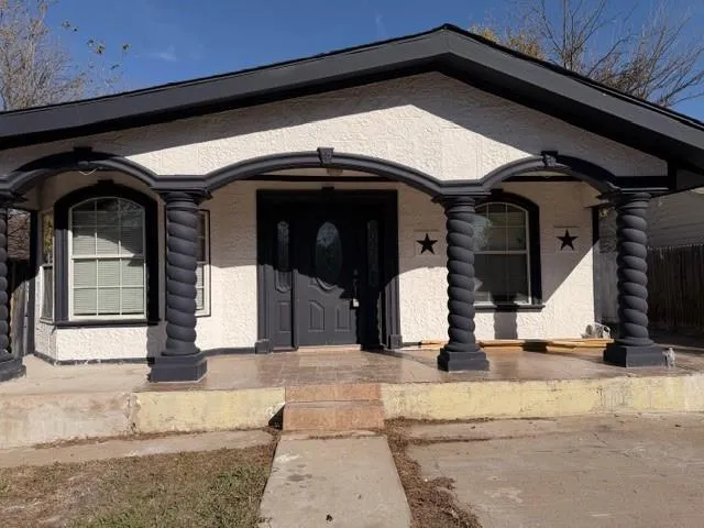 a view of entrance gate of the house