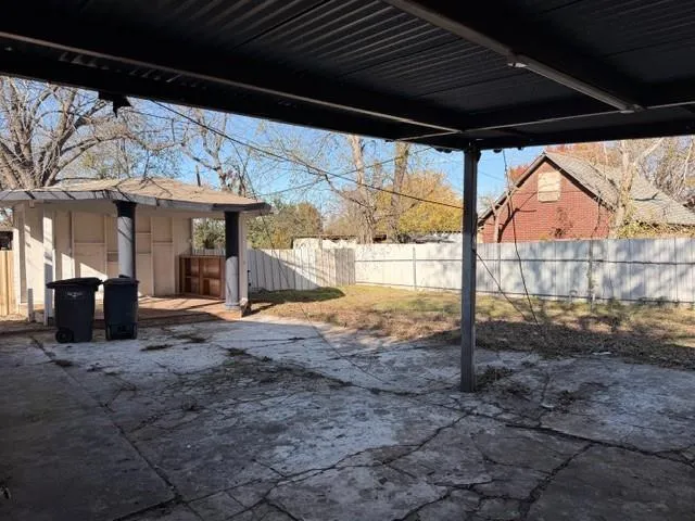 a view of a shaded area in the back yard