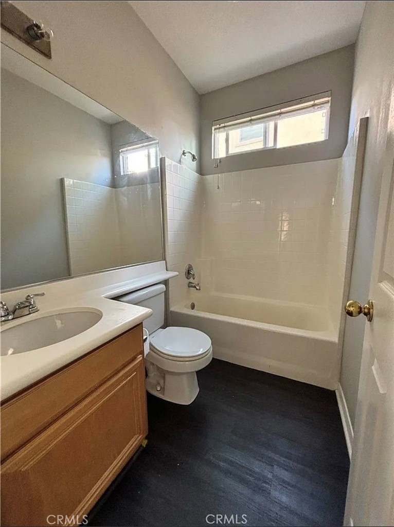 3715 Club Rancho Drive Palmdale, CA 93551 - Photo 18 of 52 a bathroom with a double vanity sink toilet and shower