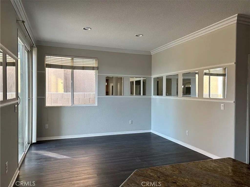 3715 Club Rancho Drive Palmdale, CA 93551 - Photo 19 of 52 a view of a house with wooden floor and a window