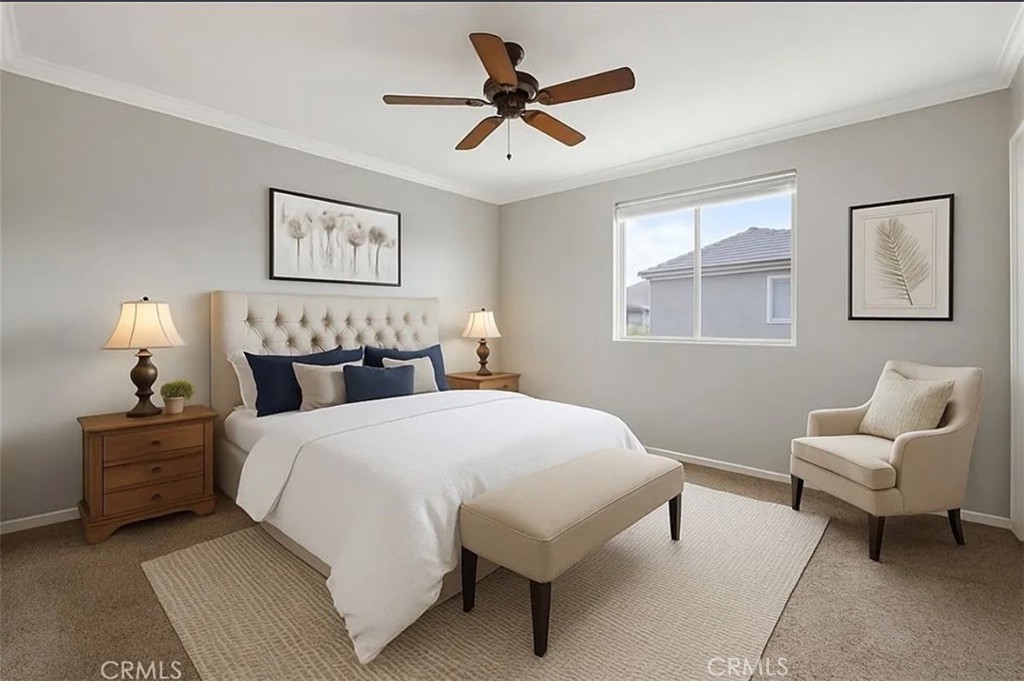 3715 Club Rancho Drive Palmdale, CA 93551 - Photo 33 of 52 a bedroom with a bed and a couch