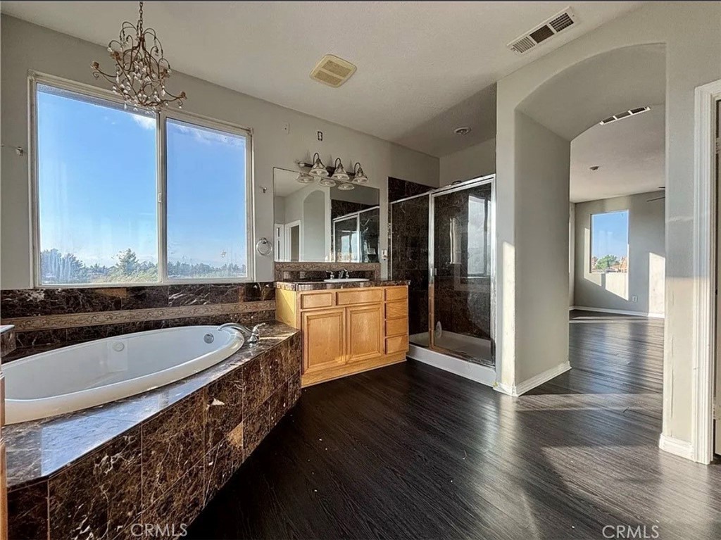 3715 Club Rancho Drive Palmdale, CA 93551 - Photo 41 of 52 a kitchen with stainless steel appliances a sink and a refrigerator