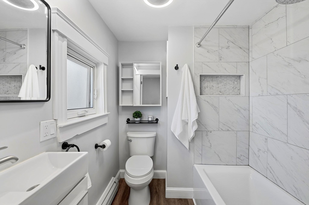 99 Mason Street, Unit 2 Salem, MA 01970 - Photo 10 of 25 a bathroom with a sink toilet and bathtub