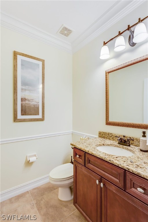 8517 Sumner Avenue Fort Myers, FL 33908 - Photo 15 of 25 a bathroom with a granite countertop toilet sink and mirror