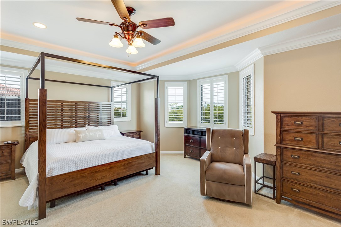 8517 Sumner Avenue Fort Myers, FL 33908 - Photo 18 of 25 a bedroom with a bed couch and a window