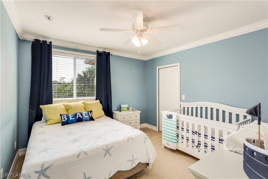 8517 Sumner Avenue Fort Myers, FL 33908 - Photo 20 of 25 a bedroom with a bed and a window
