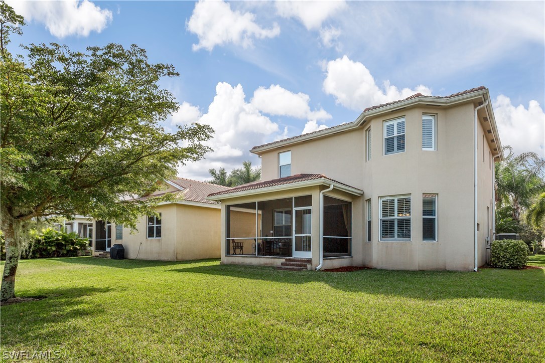 8517 Sumner Avenue Fort Myers, FL 33908 - Photo 25 of 25 a view of a house with a backyard