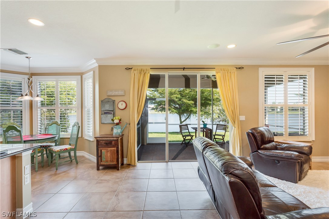 8517 Sumner Avenue Fort Myers, FL 33908 - Photo 7 of 25 a living room with furniture and large windows