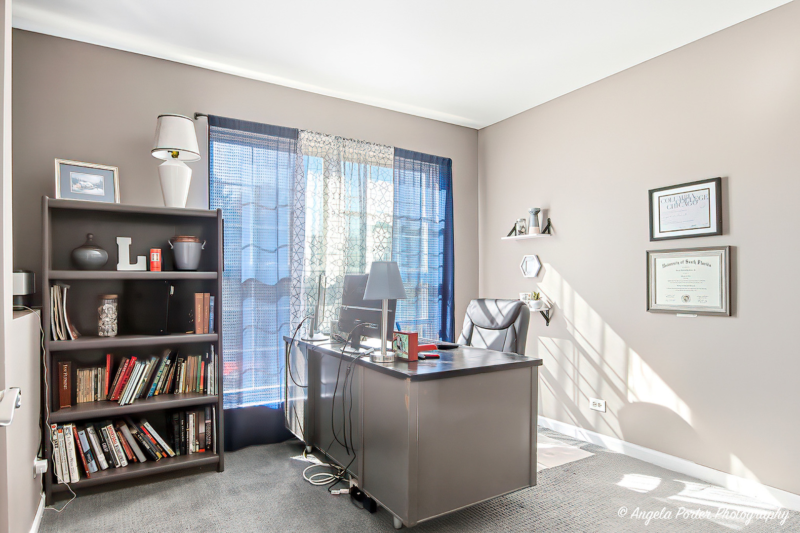 2019 Aspen Drive Woodstock, IL 60098 - Photo 17 of 31 a view of living room with furniture and book shelf