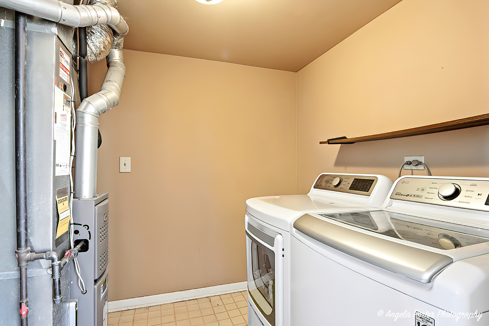 2019 Aspen Drive Woodstock, IL 60098 - Photo 25 of 31 a utility room with dryer and washer