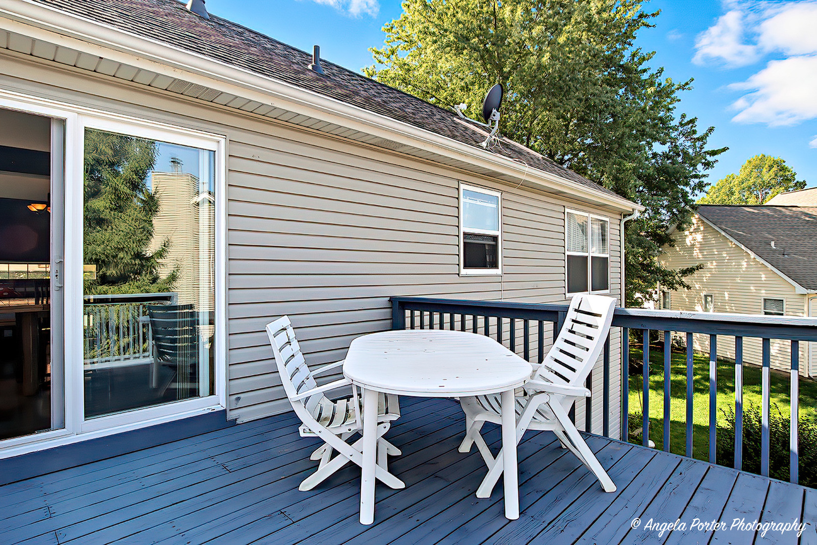 2019 Aspen Drive Woodstock, IL 60098 - Photo 26 of 31 a view of a patio with a table and chairs