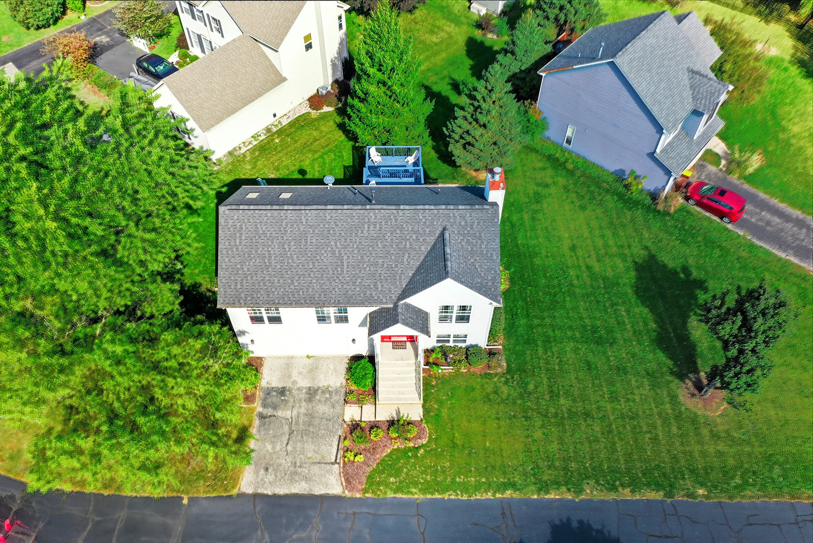 2019 Aspen Drive Woodstock, IL 60098 - Photo 27 of 31 an aerial view of residential houses with outdoor space and trees