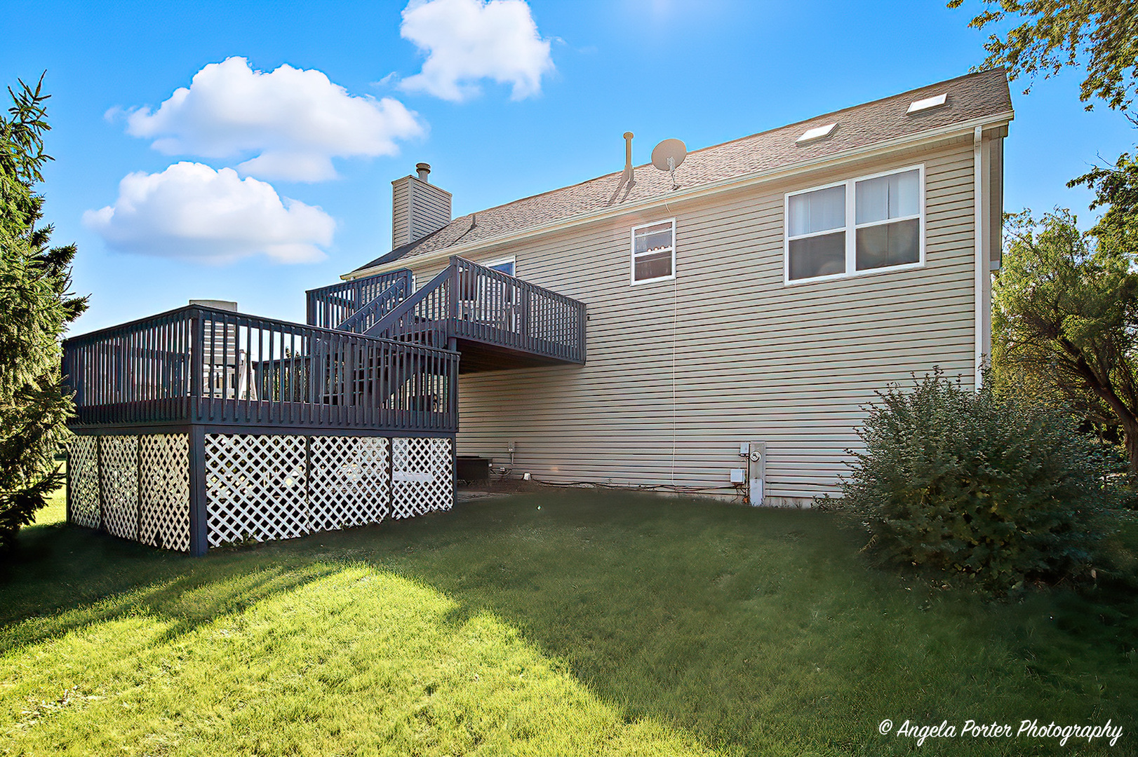 2019 Aspen Drive Woodstock, IL 60098 - Photo 5 of 31 a view of a house with a yard
