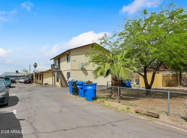 a view of a house with a street