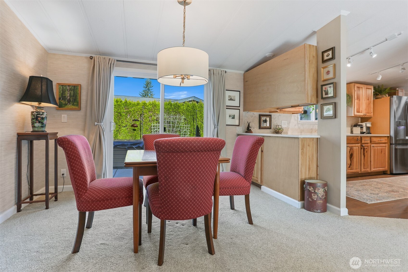 23716 9th Place West Bothell, WA 98021 - Photo 12 of 40 a view of a dining room with furniture window and outside view