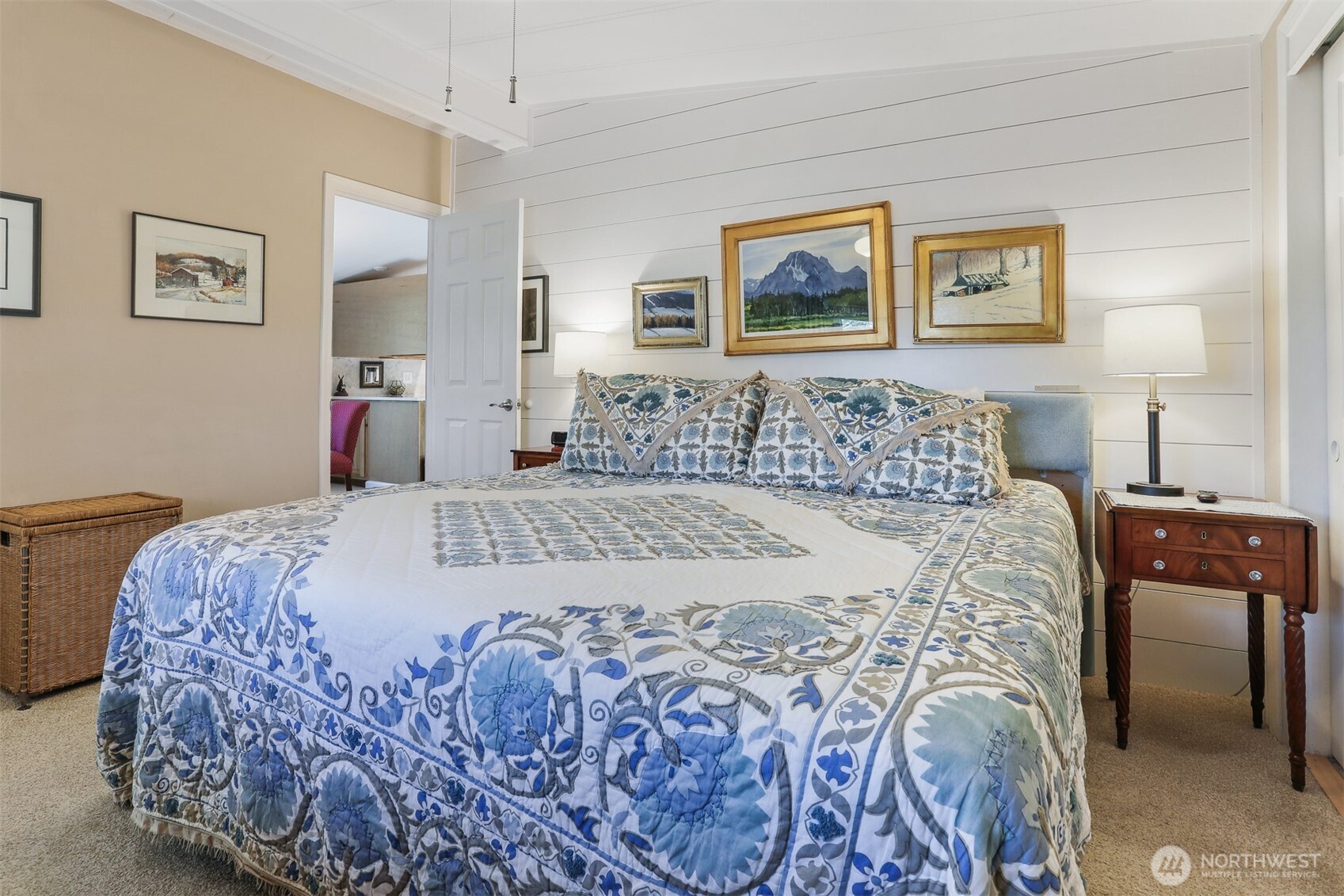 23716 9th Place West Bothell, WA 98021 - Photo 20 of 40 a bedroom with a large bed and a chandelier