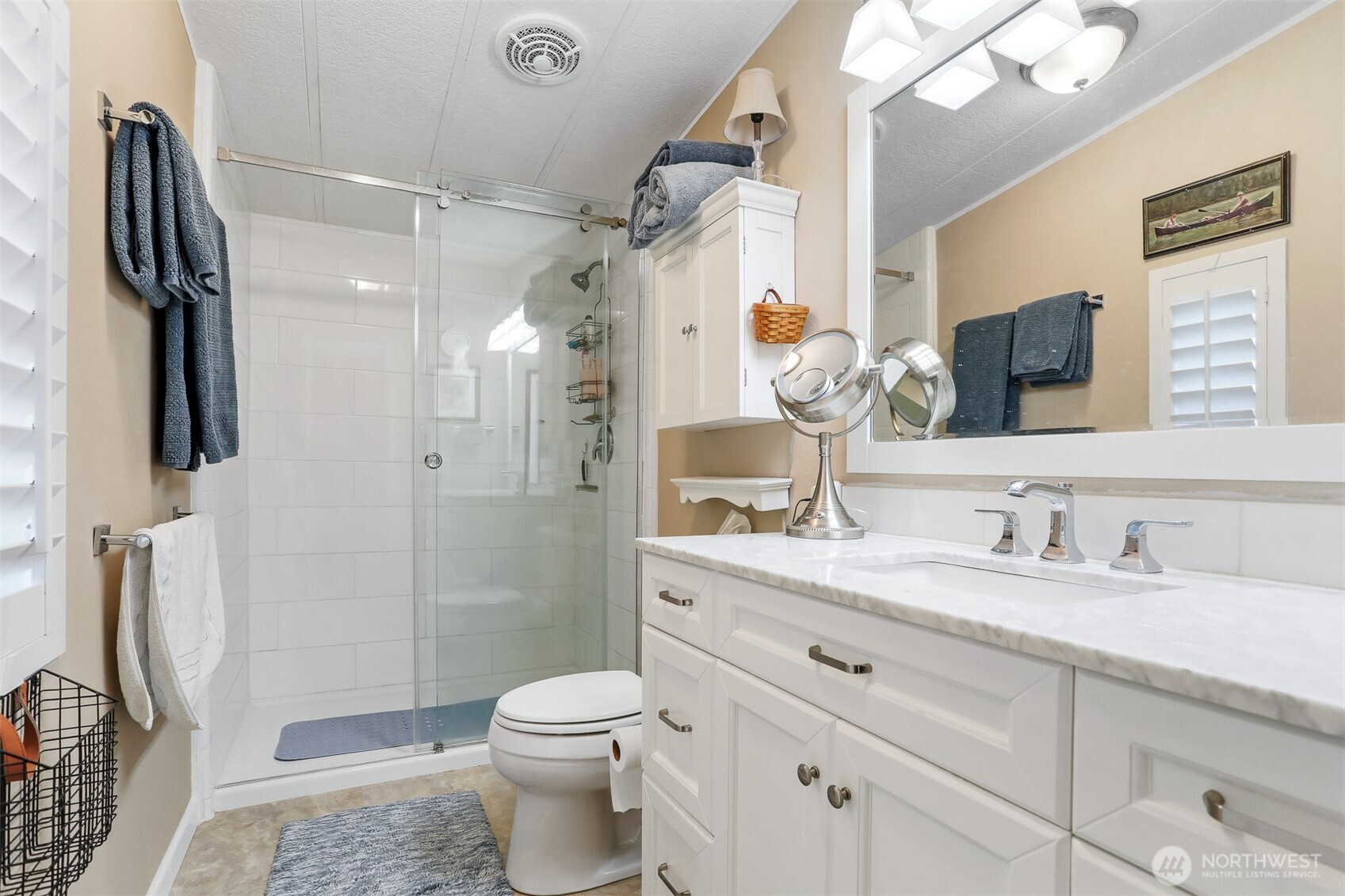 23716 9th Place West Bothell, WA 98021 - Photo 22 of 40 a bathroom with a sink vanity granite toilet and shower
