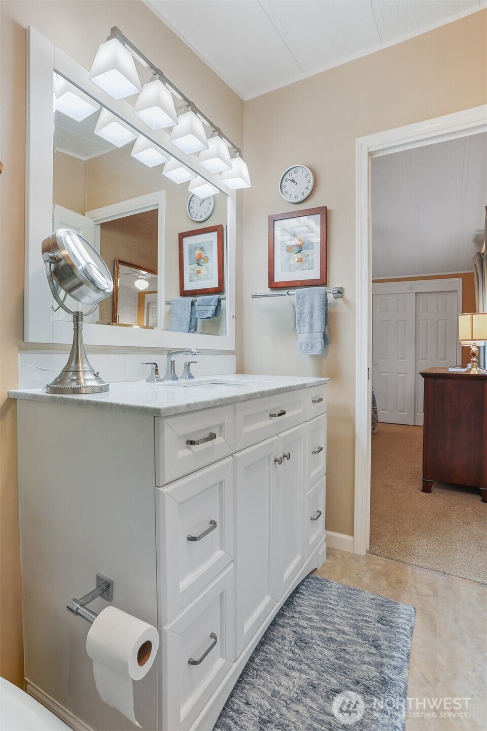 23716 9th Place West Bothell, WA 98021 - Photo 23 of 40 a bathroom with a sink vanity and mirror