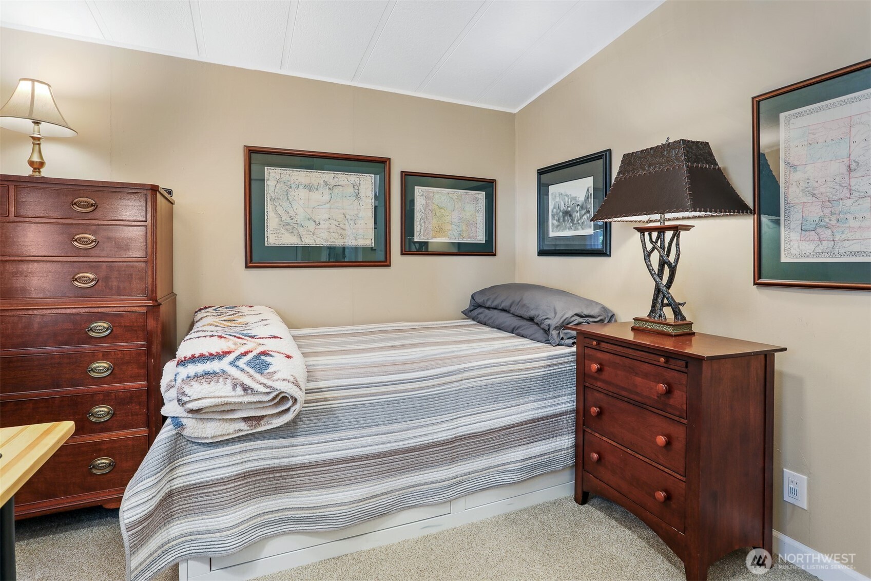 23716 9th Place West Bothell, WA 98021 - Photo 25 of 40 a bedroom with a bed and a lamp on dresser