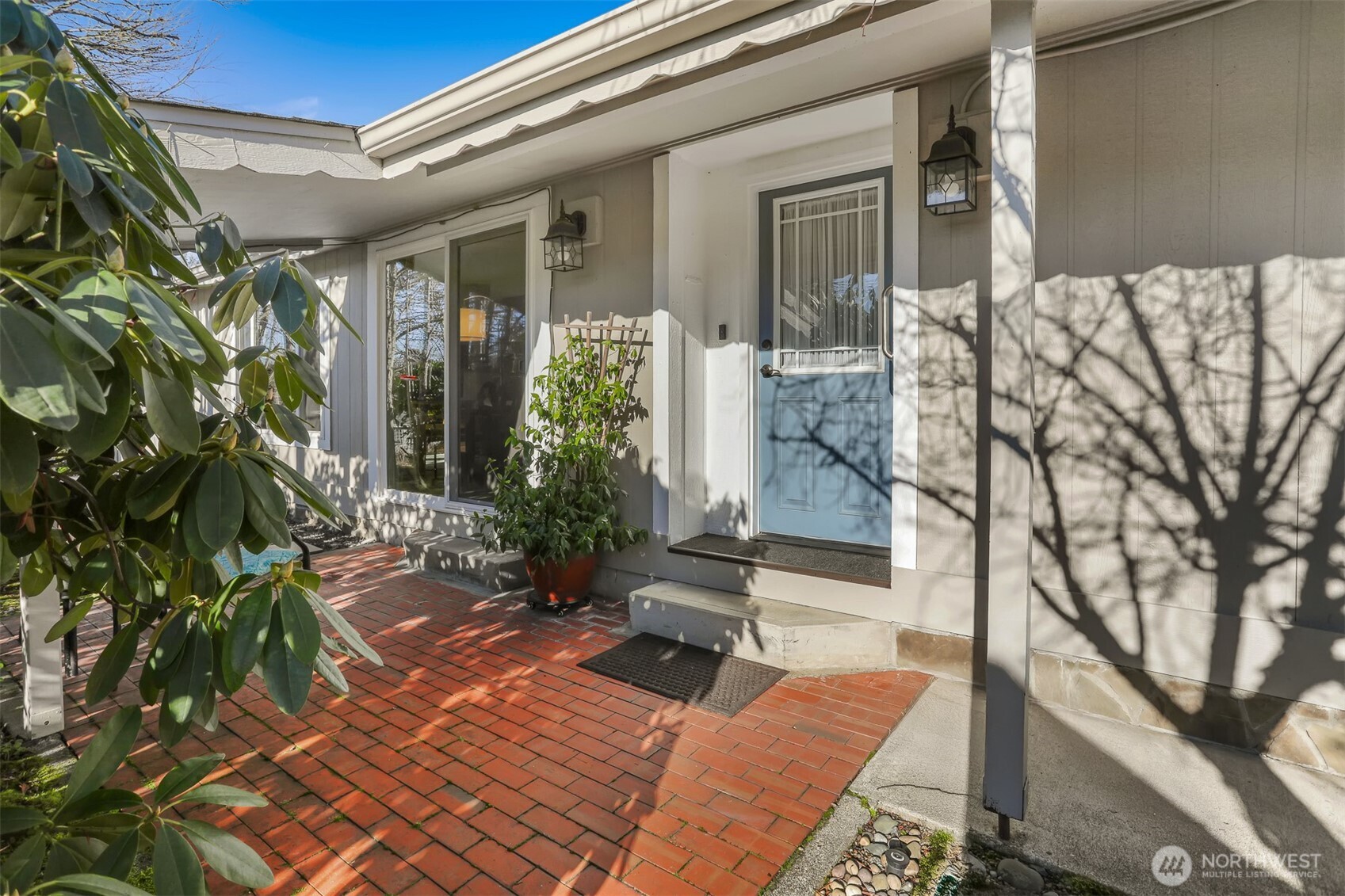 23716 9th Place West Bothell, WA 98021 - Photo 5 of 40 a view of house with backyard and outdoor seating