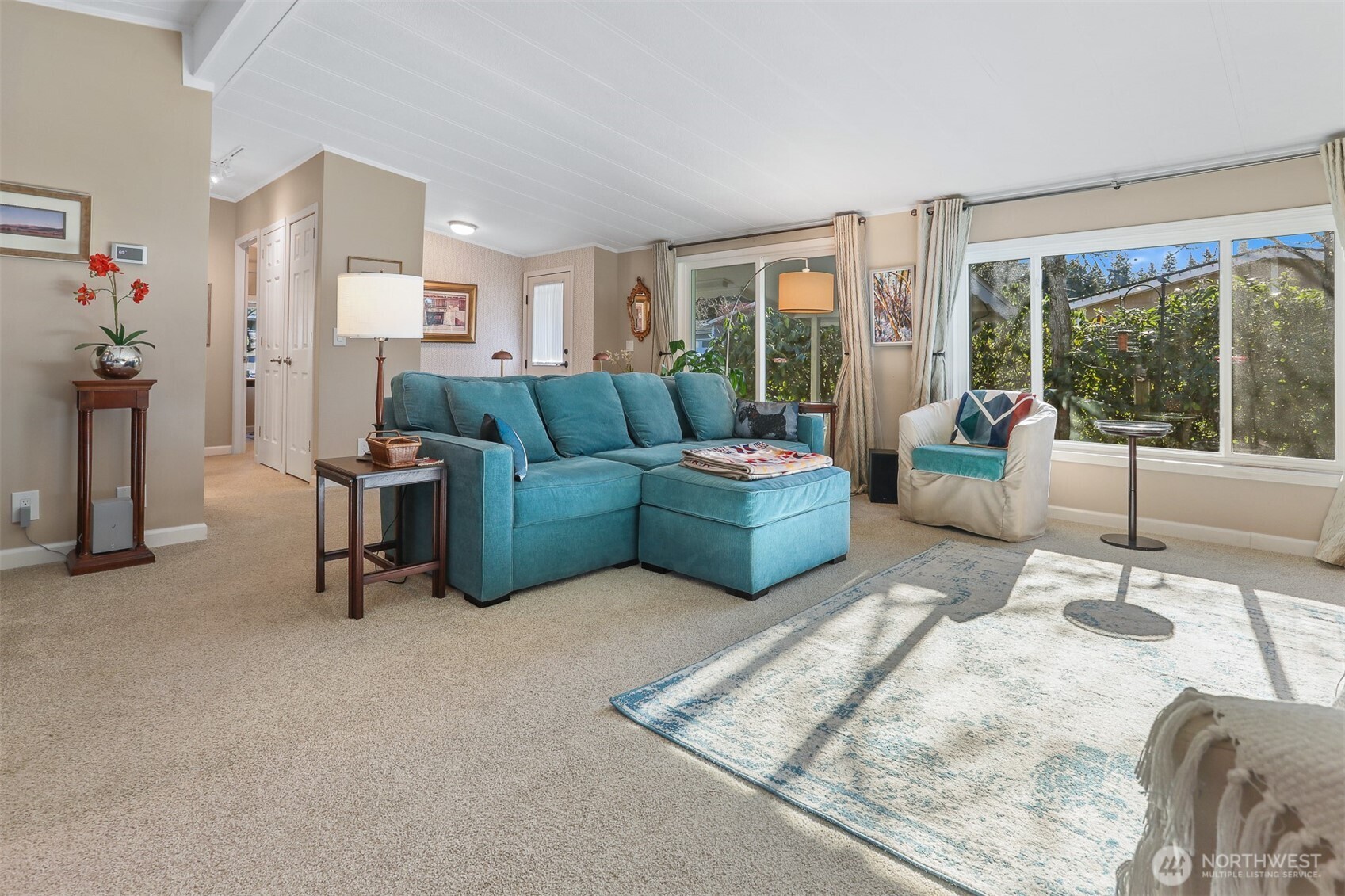23716 9th Place West Bothell, WA 98021 - Photo 9 of 40 a living room with furniture and a large window