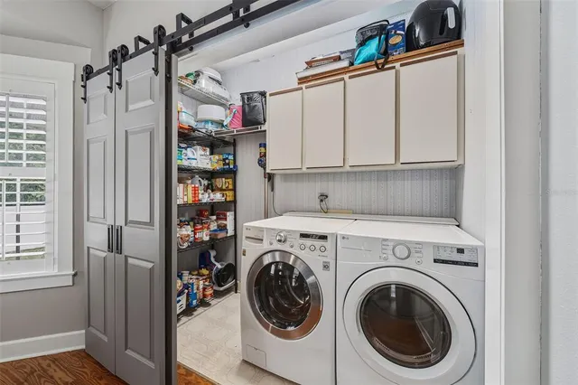 a utility room with dryer and washer