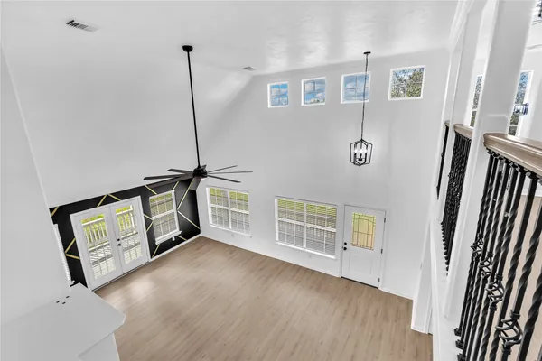 a view of a livingroom with wooden floor