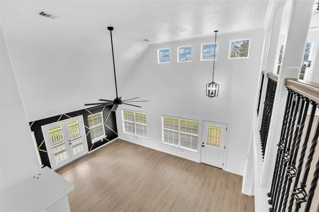 a view of a livingroom with wooden floor