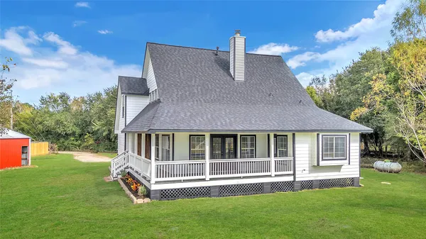 a house view with a garden space