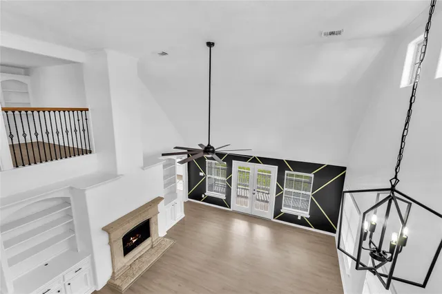 a view of a hallway with stairs