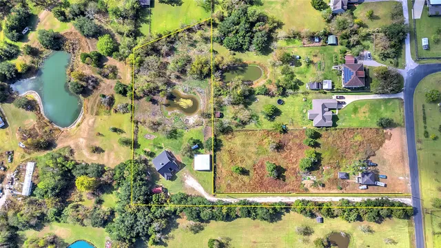 a view of swimming pool with a garden